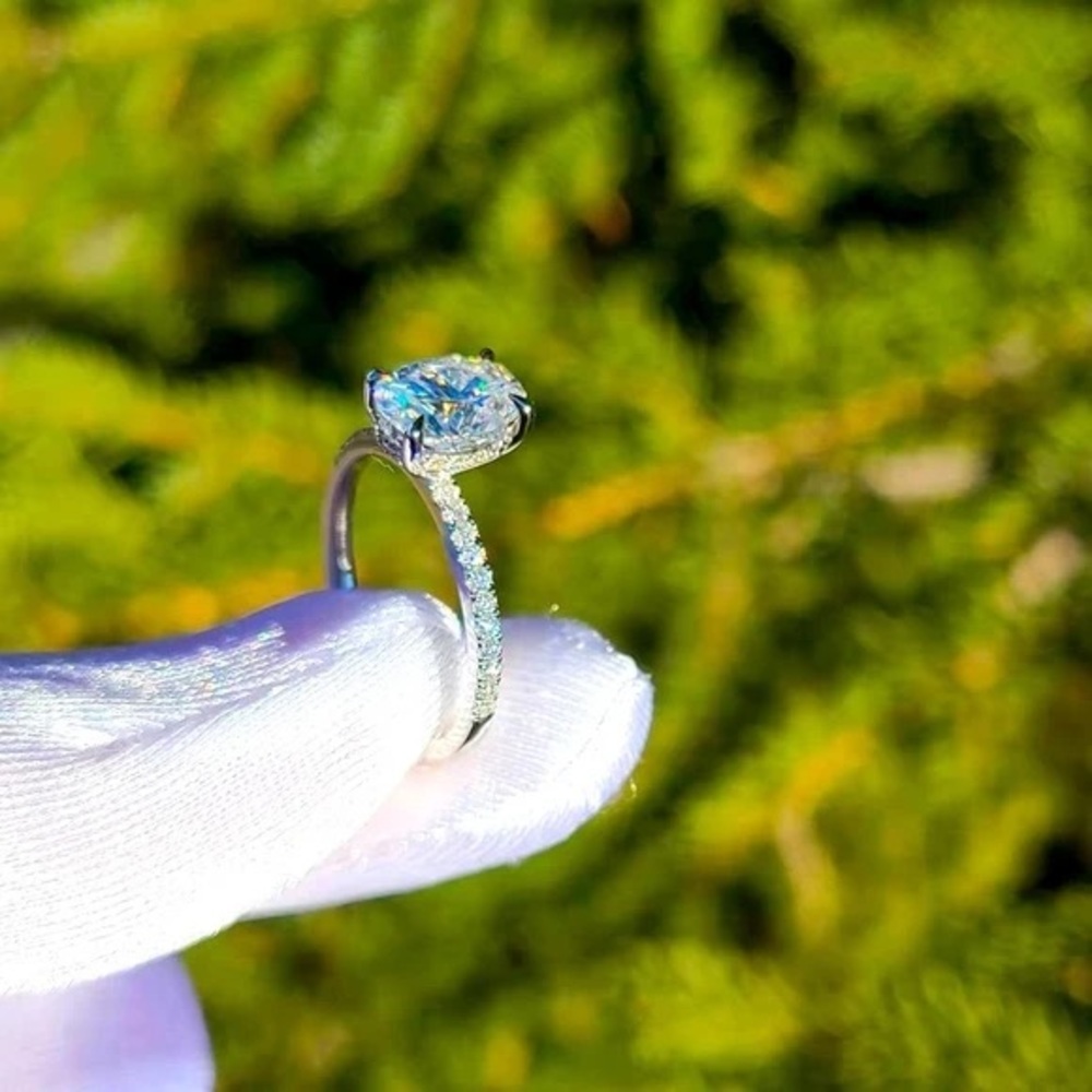Solid 14k gold 1.5ct oval moissanite ring with side diamond